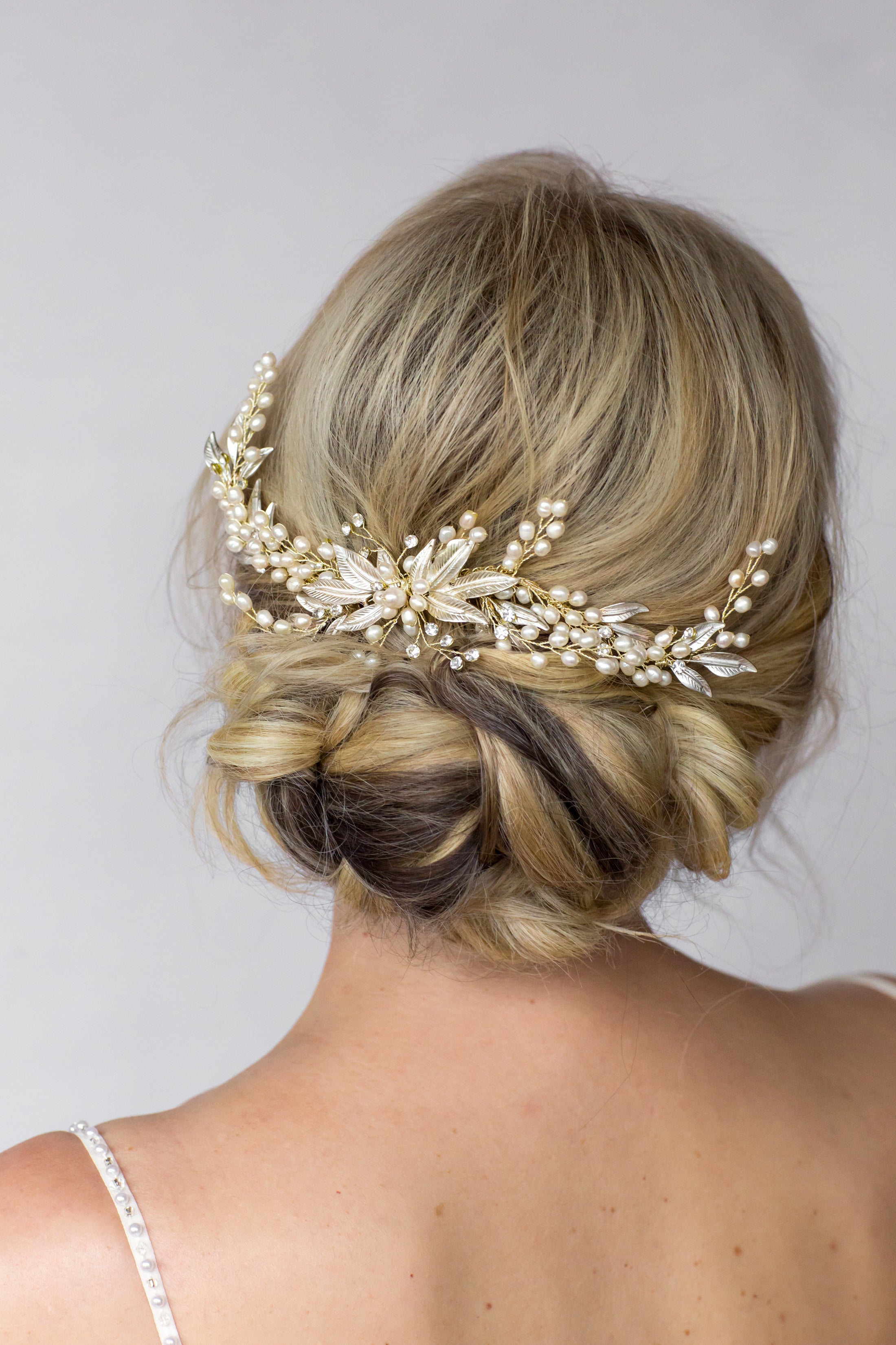 golden pearl and leaf bridal hair comb in boho wedding up do
