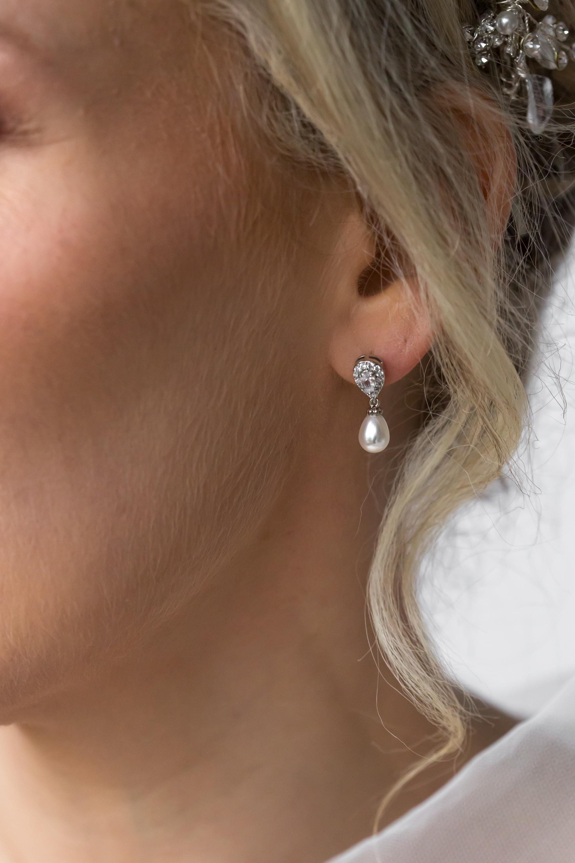 Minimalist pearl drop earrings by Emma Rose Jewellery