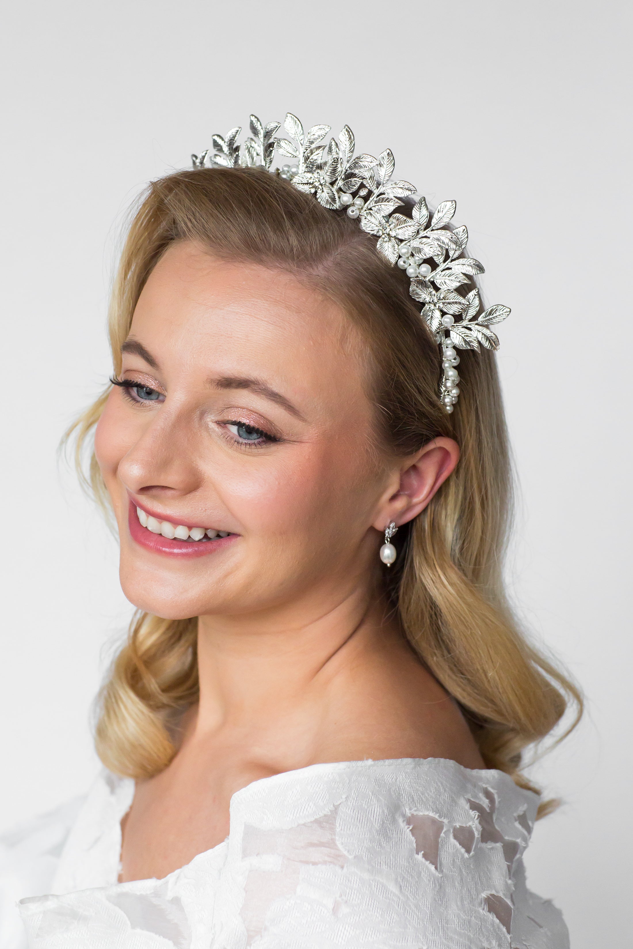 bridal leafy crown and pearl drop earrings